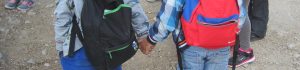 two children holding hands